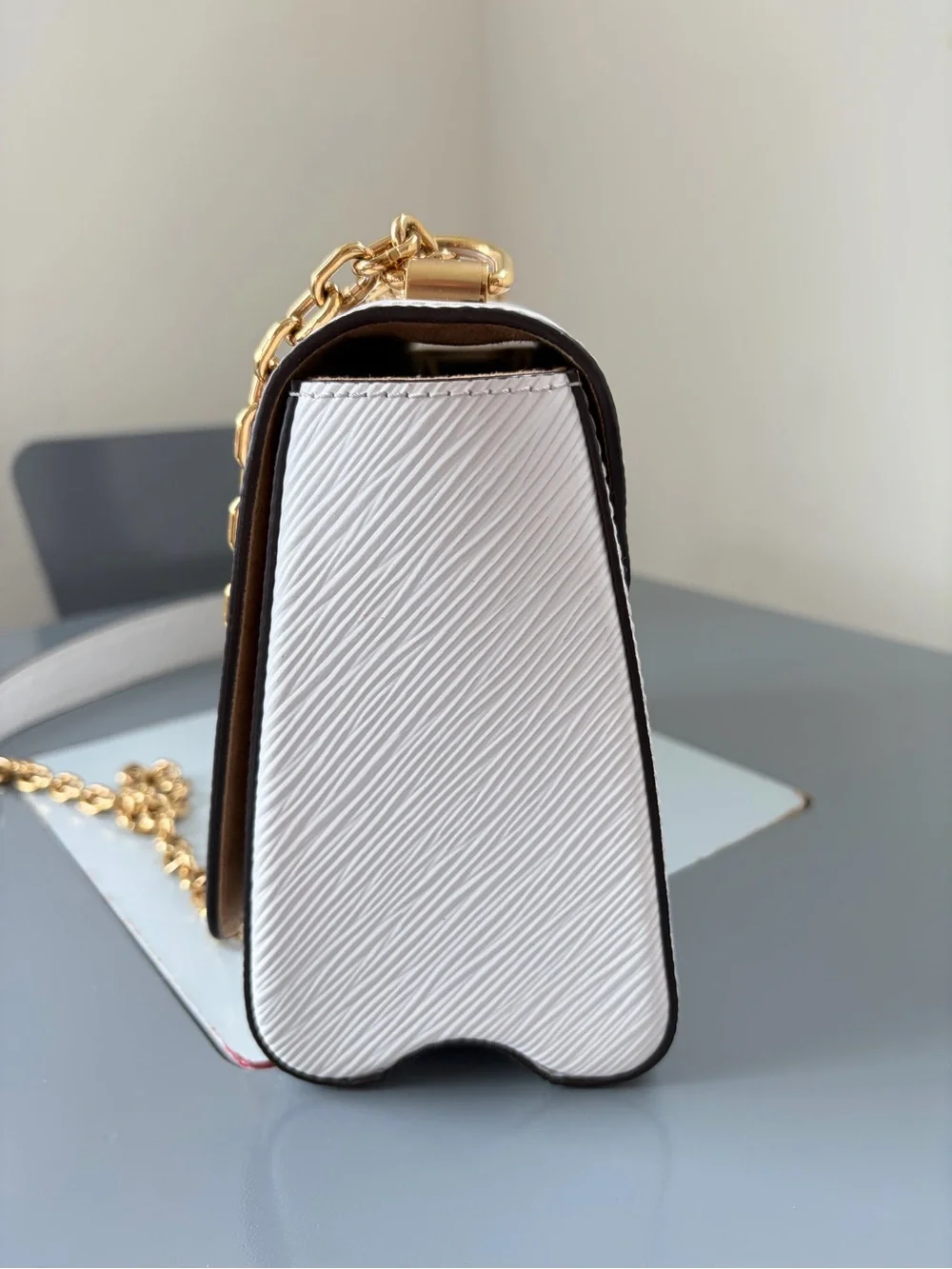 Louis Vuitton White Crossbody Bag with Gold Chain and LV Logo